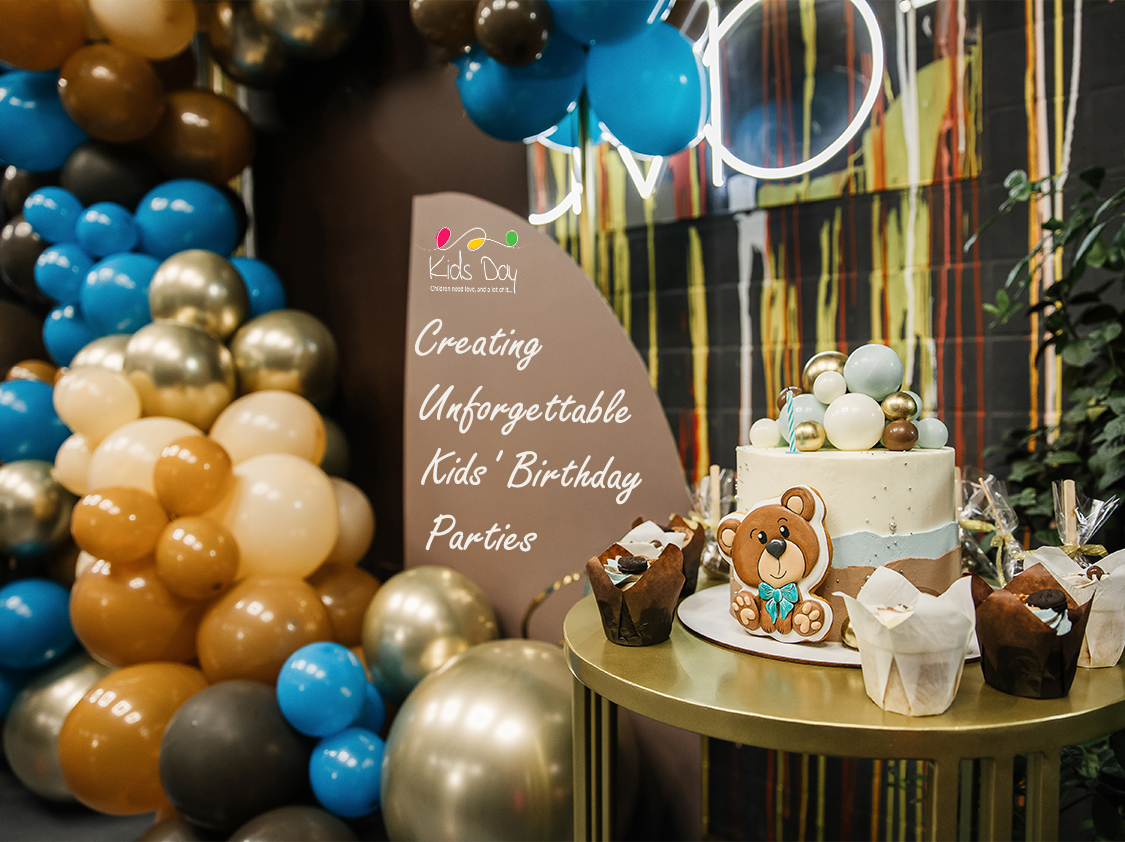 A stylish kids' birthday party setup featuring elegant blue and gold balloons, a bear-themed cake, and the slogan 'Creating Unforgettable Kids' Birthday Parties' by Kids Day.